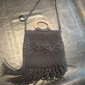 Danielle Nicole black bag. Crochet-like black crossbody bag. Only used once.